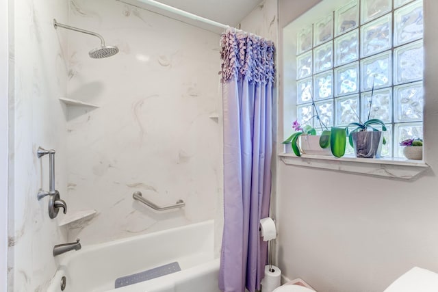 bathroom with toilet and shower / bathtub combination with curtain