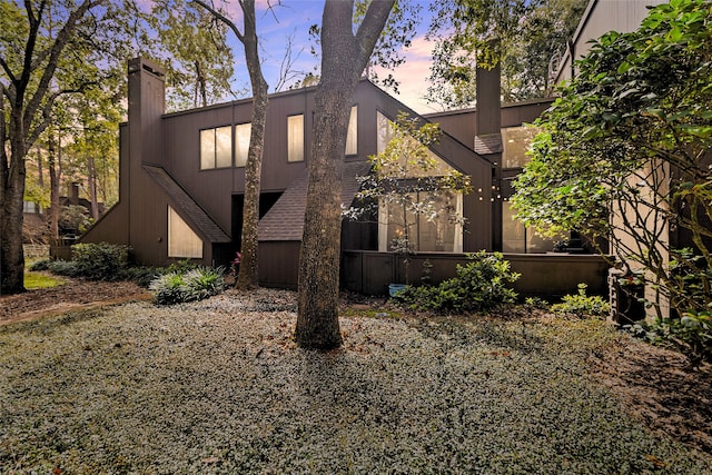 exterior space featuring a chimney