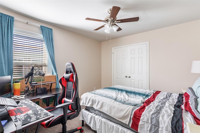 bedroom featuring carpet and ceiling fan