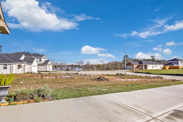 view of yard with a residential view