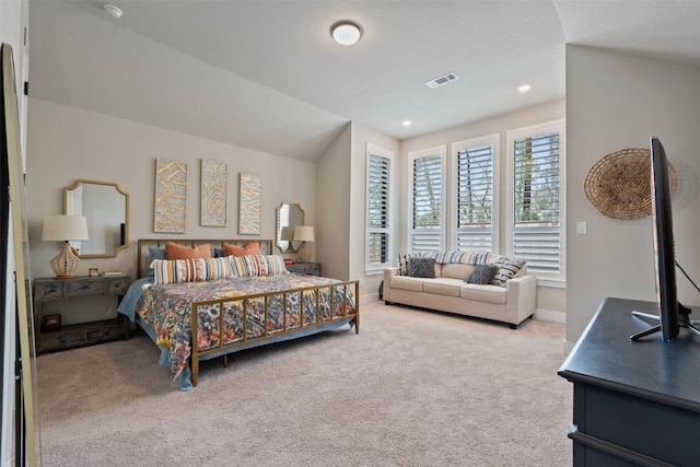 carpeted bedroom featuring recessed lighting, visible vents, baseboards, and lofted ceiling