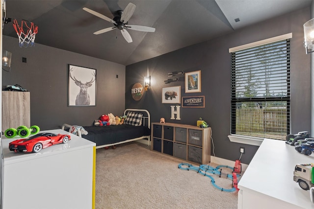 bedroom featuring ceiling fan, lofted ceiling, and carpet floors