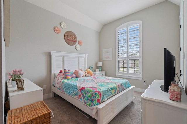 carpeted bedroom featuring lofted ceiling, multiple windows, and baseboards