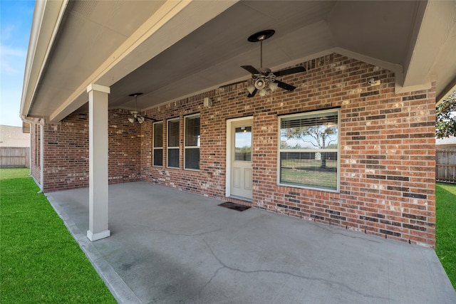 view of patio / terrace featuring ceiling fan and fence