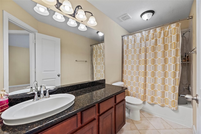 bathroom with visible vents, toilet, shower / tub combo with curtain, tile patterned floors, and vanity