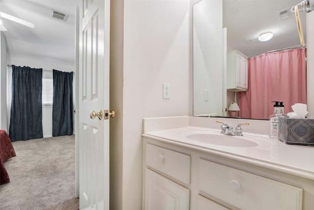 full bathroom with vanity and visible vents