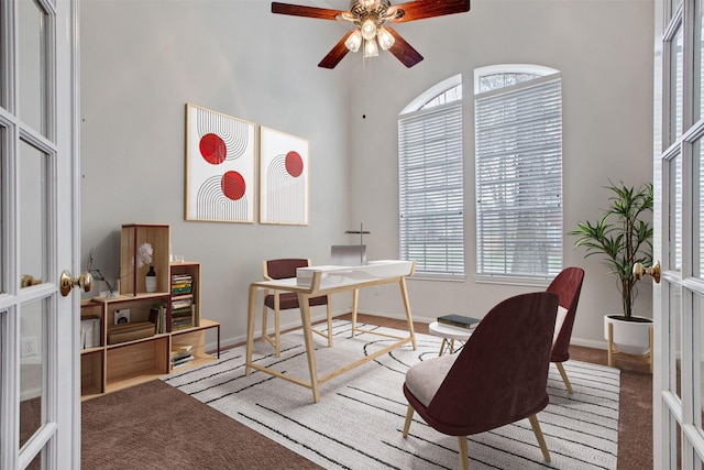 carpeted office featuring french doors, plenty of natural light, a ceiling fan, and baseboards