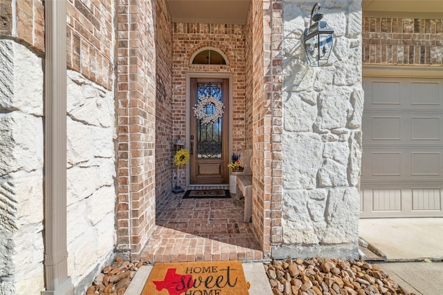 entrance to property featuring a garage