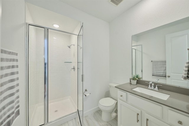 bathroom with toilet, a shower stall, visible vents, and vanity