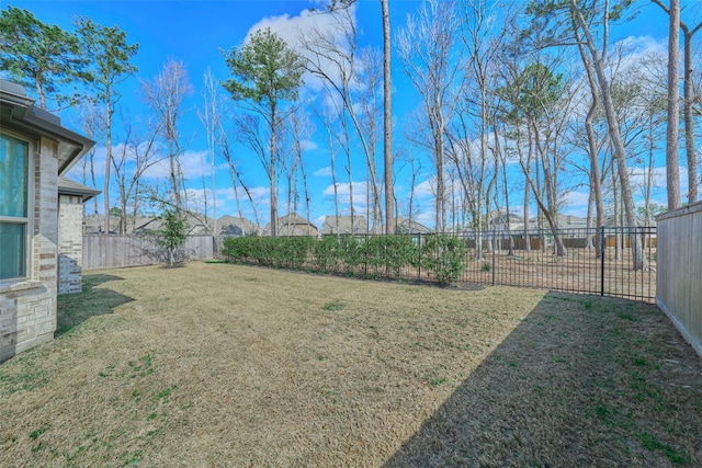 view of yard featuring a fenced backyard