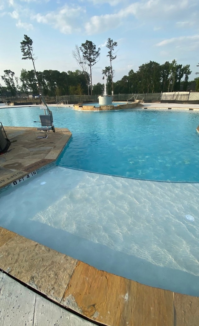 21500 Jordan Pond Rdg, Porter, TX 77365 - pool with a patio and fence