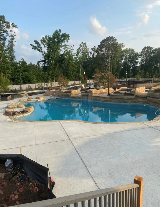21500 Jordan Pond Rdg, Porter, TX 77365 - view of swimming pool featuring a fenced in pool, a patio area, and fence