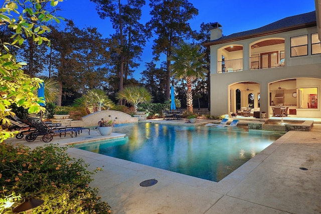 outdoor pool featuring a patio area