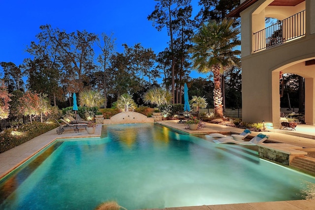 outdoor pool featuring a patio area