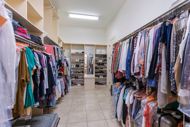 spacious closet with tile patterned flooring