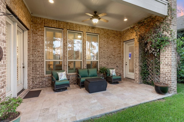 view of patio / terrace with ceiling fan and outdoor lounge area