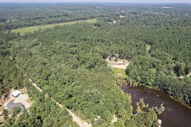 aerial view featuring a forest view