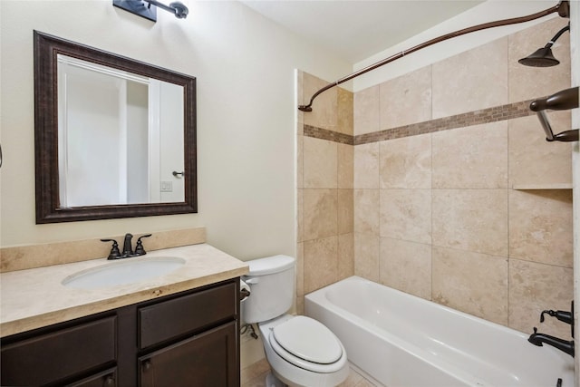 full bath with tub / shower combination, vanity, and toilet