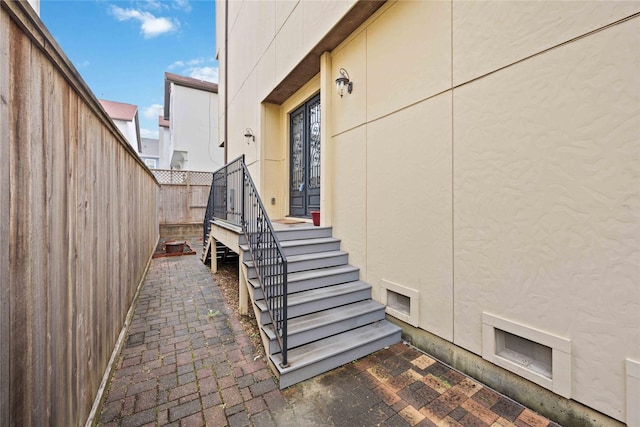 view of property exterior with fence