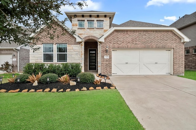 view of front facade featuring a garage, brick siding, concrete driveway, stone siding, and a front yard