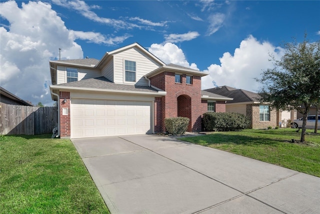 traditional-style home featuring driveway, a front yard, fence, and brick siding