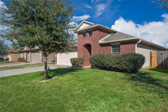 view of front facade with a garage, concrete driveway, fence, a front lawn, and brick siding