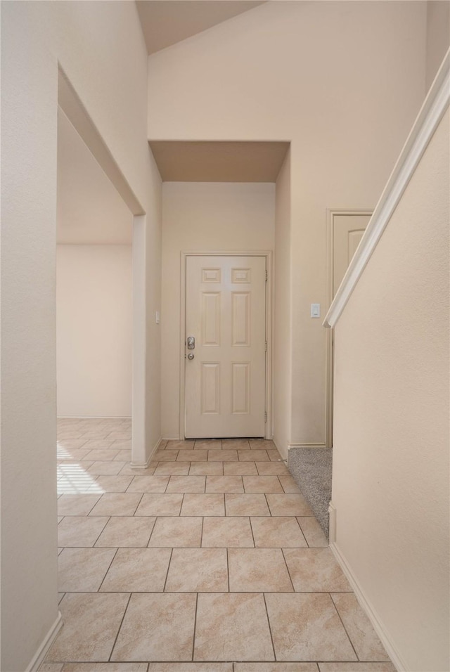 entryway featuring light tile patterned floors