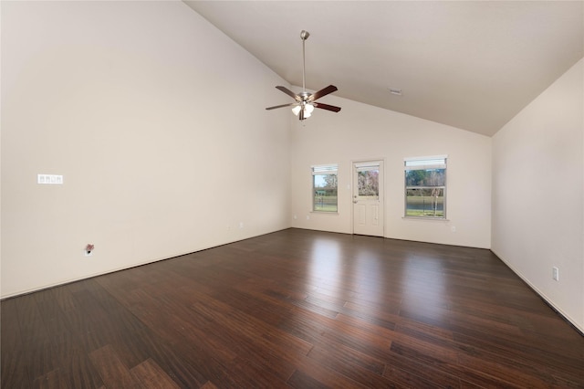 spare room with ceiling fan, high vaulted ceiling, dark wood-style flooring, and visible vents