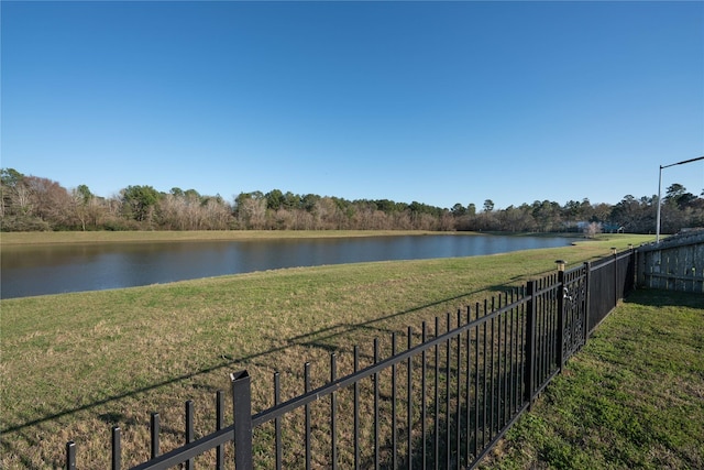 water view featuring fence