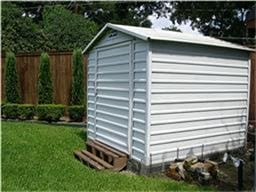 view of shed featuring a fenced backyard