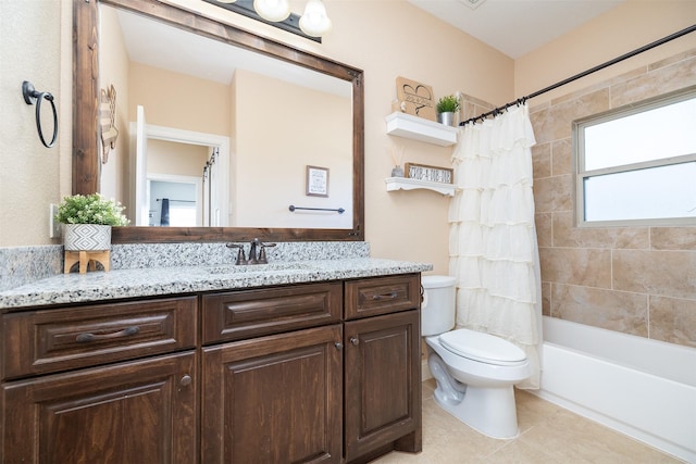 bathroom with shower / bath combination with curtain, vanity, toilet, and tile patterned floors