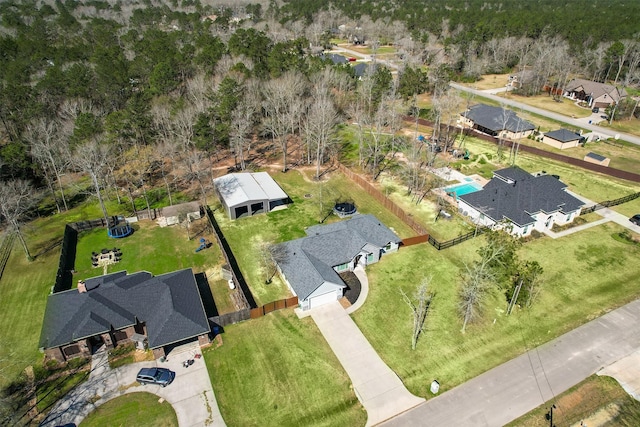 birds eye view of property with a residential view