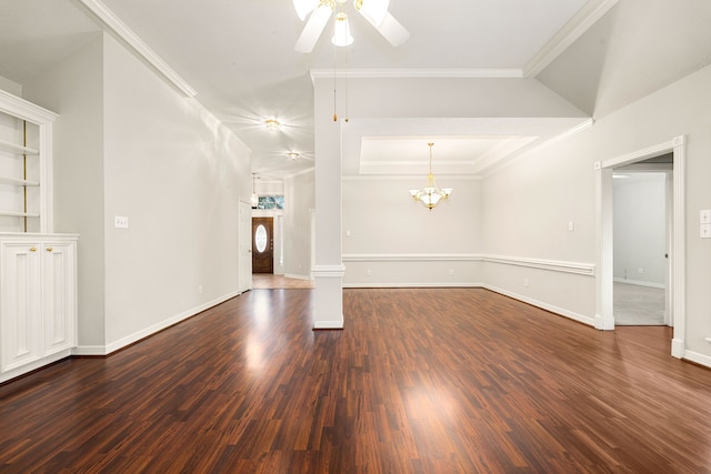 unfurnished living room with baseboards, ceiling fan with notable chandelier, wood finished floors, and crown molding