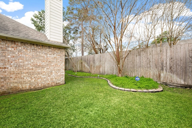 view of yard with fence