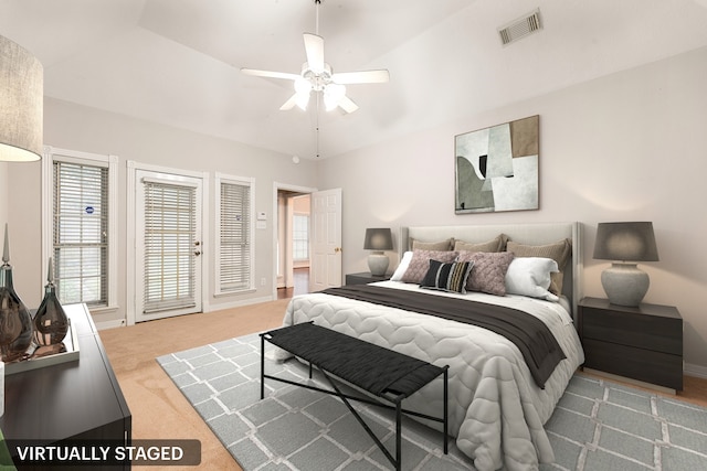 carpeted bedroom featuring baseboards, visible vents, and ceiling fan