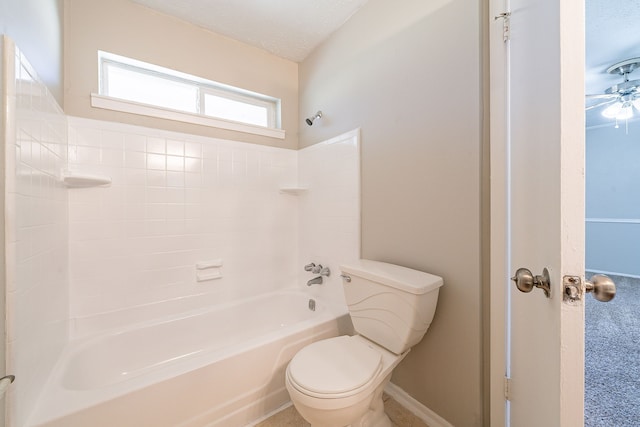 full bath featuring a textured ceiling, bathing tub / shower combination, and toilet