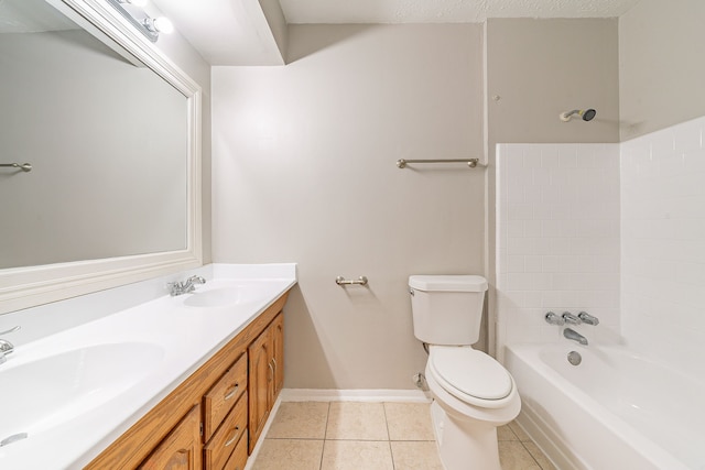 full bath with toilet, baseboards, a sink, and tile patterned floors