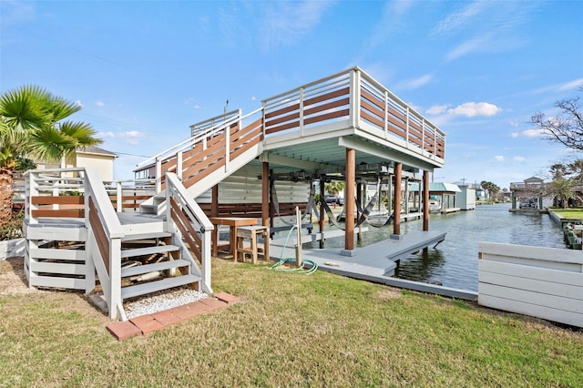 dock area featuring a lawn