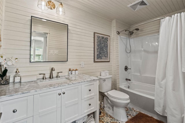 full bathroom with toilet, wood walls, vanity, visible vents, and shower / bath combination with curtain