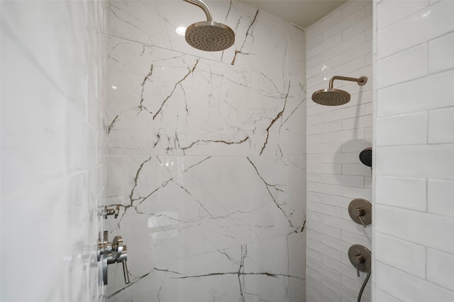 full bath featuring a tile shower