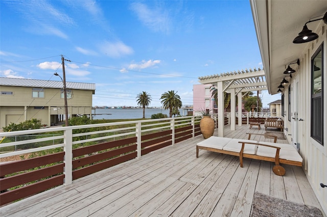 wooden deck featuring a pergola