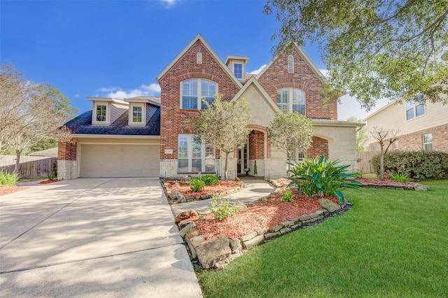 view of front facade featuring a front yard, stone siding, brick siding, and fence