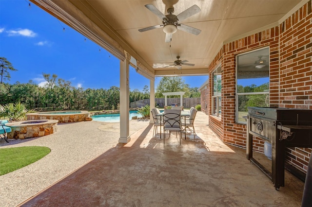 view of patio featuring a fenced in pool, ceiling fan, a fenced backyard, an in ground hot tub, and outdoor dining space