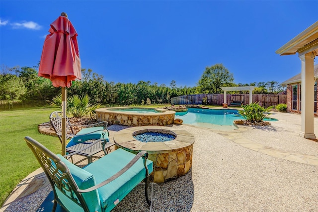 view of swimming pool with a lawn, a fenced in pool, an in ground hot tub, fence, and a patio area