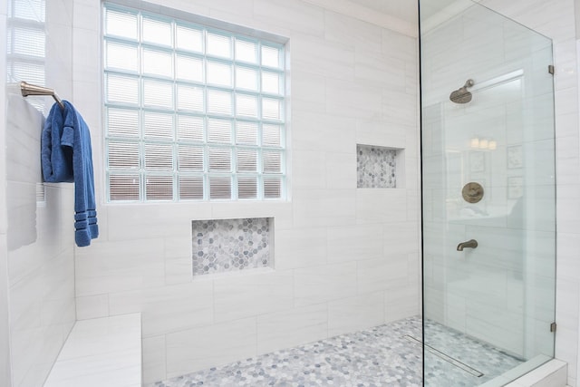 full bathroom featuring a walk in shower