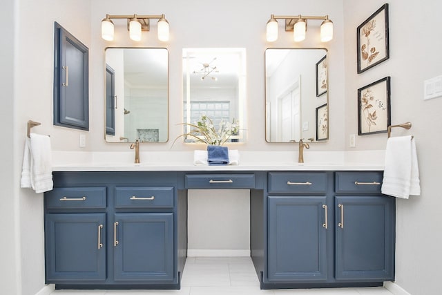 bathroom with a sink and double vanity