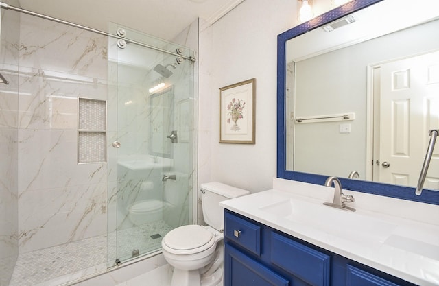 full bathroom with a marble finish shower, visible vents, toilet, and vanity