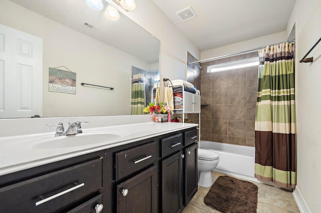 bathroom with shower / bath combo, visible vents, vanity, and toilet