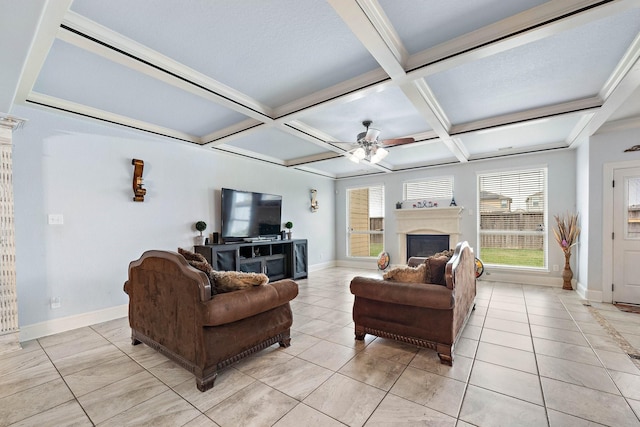 living area featuring light tile patterned floors, ceiling fan, a fireplace, and coffered ceiling