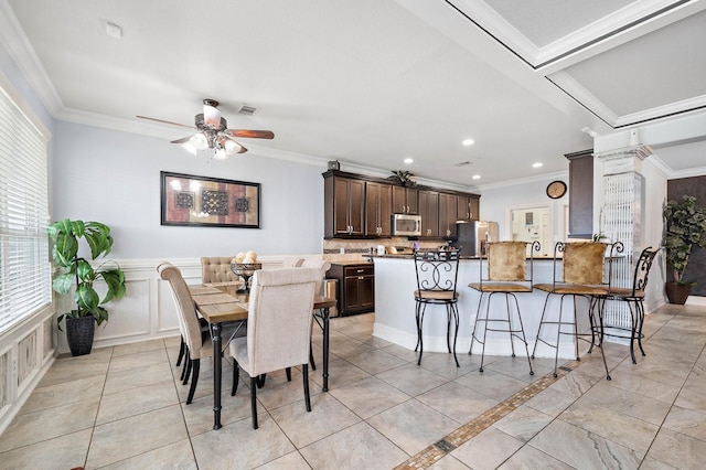 dining space featuring ceiling fan, recessed lighting, visible vents, and crown molding